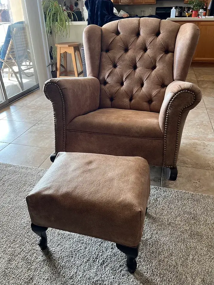 Upholstery classic brown tufted leather wingback armchair
